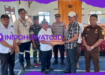 Pani Gold Project Serahkan Bantuan Untuk Warga Terdampak Banjir Di Paguat